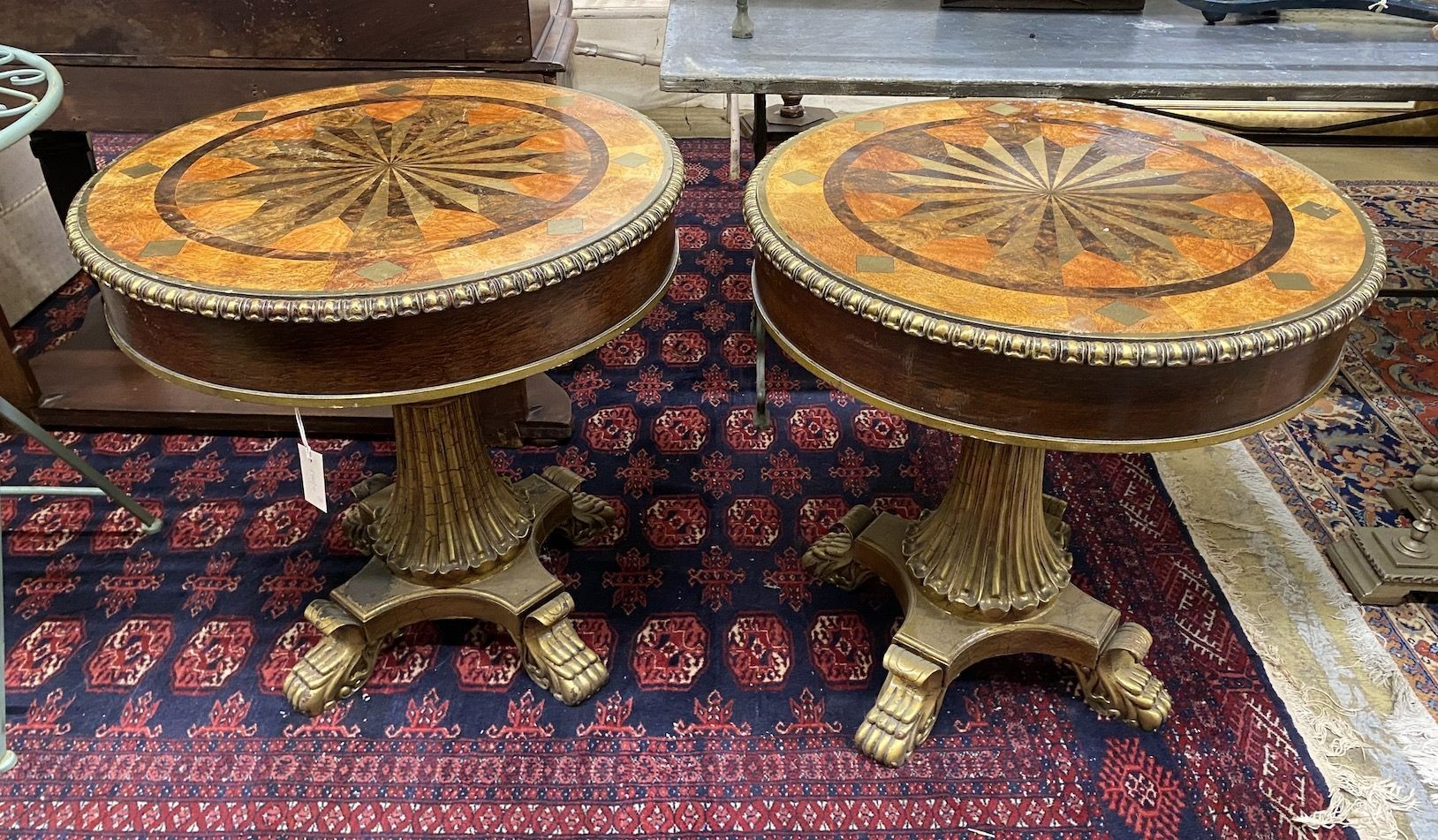 A pair of Empire style circular wood and composition faux parquetry occasional tables, diameter 69cm, height 69cm